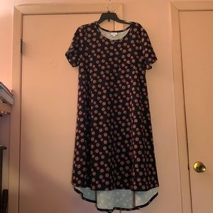 Large black Carly dress with peach flowers.